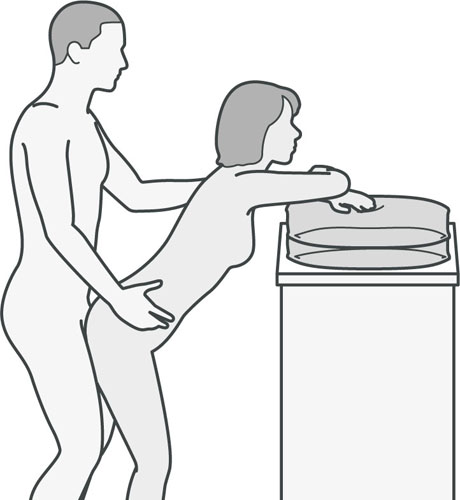 An illustration of a sexual position that's good if either partner has knee problems or a hip replacement.