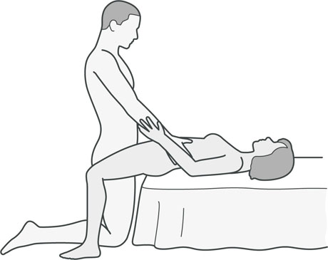 An illustration of a sexual position that's good for women with hip, back or knee problems.