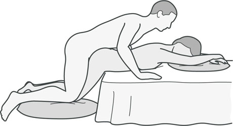 An illustration of a sexual position that's good for women with hip problems.