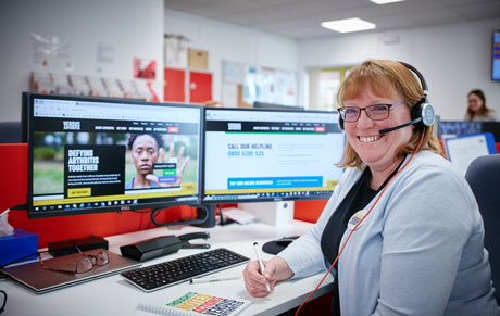 Helpline advisor smiling