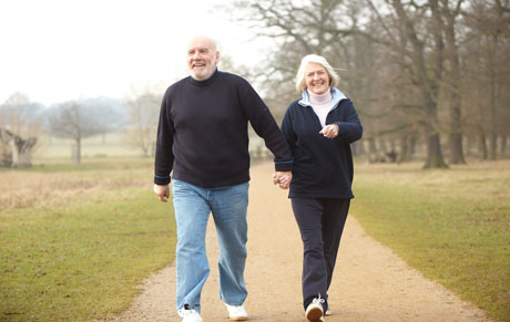 Couple holding hands and smiling