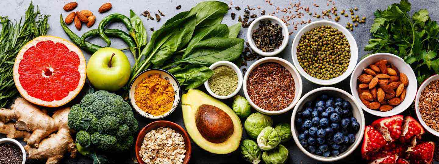 A selection of fruit, vegetables and nuts.