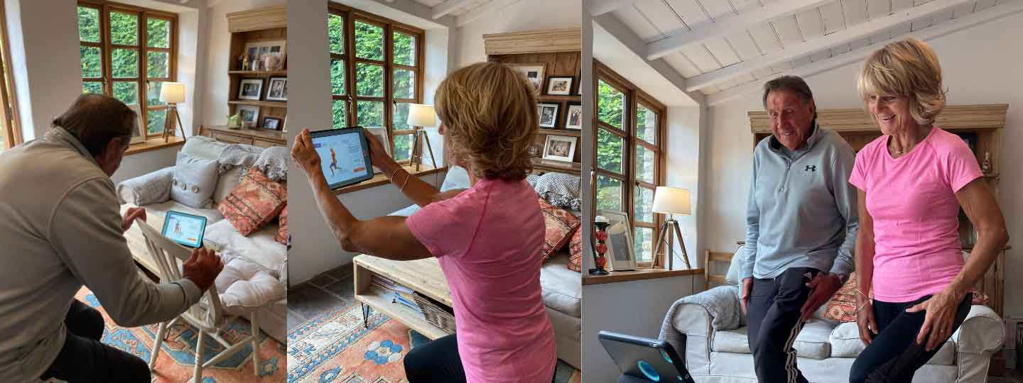 A man and lady doing exercises at home by using the Good Boost app.