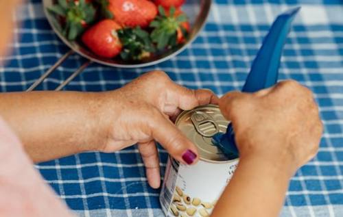 Tin opener aid