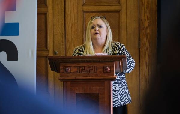 Tracy speaking at Stormont