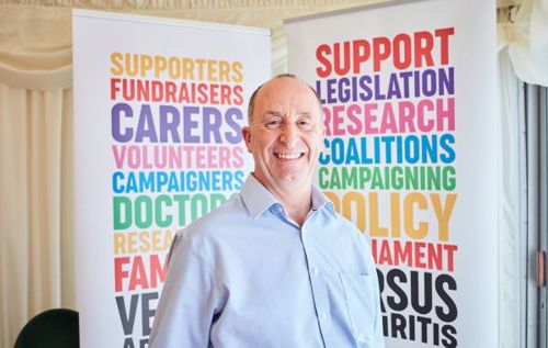 Smiling Ken at parliamentary event