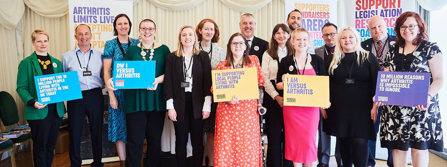 Versus Arthritis campaigners and staff at parliamentary event