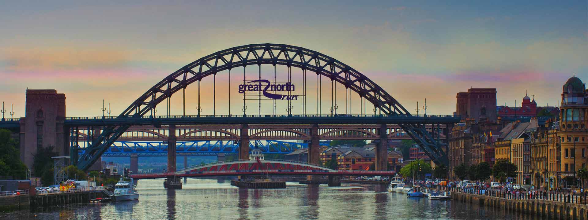 The Great North Run sign on the bridge over the river Tyne
