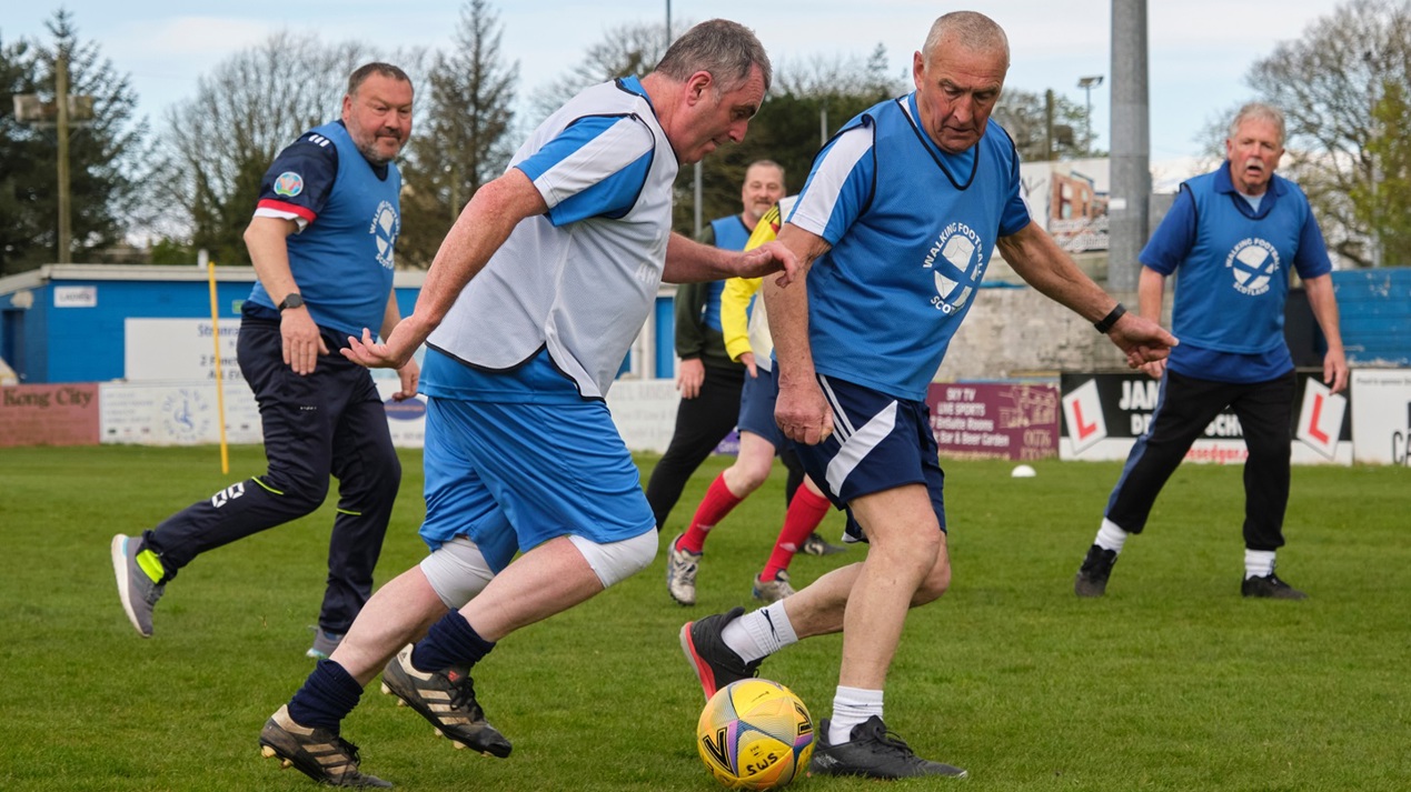 Walking Football older men in action