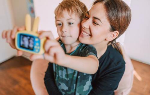 Woman and son taking selfie