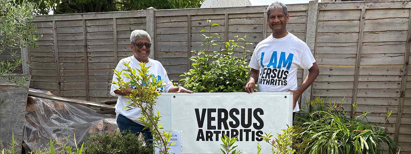 Meeta and her husband in their garden