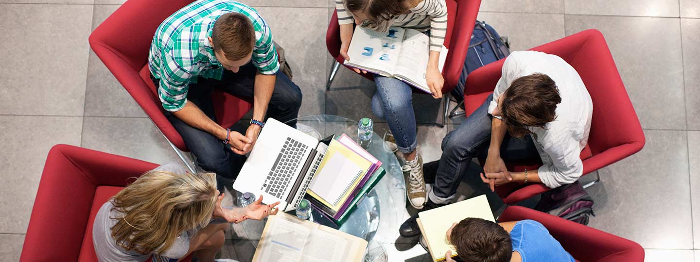 University Students Studying In A Circle
